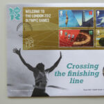 2012 First Day Coin Cover - London 2012 Crossing The Finishing Line £5 Pounds Coin PNC Cover - UK FDC Royal Mail Left